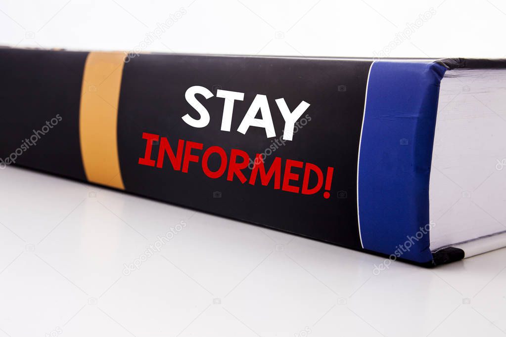 Conceptual hand writing text caption inspiration showing Stay Informed. Business concept for Be Awareness Or Awake written on the book on the white background.