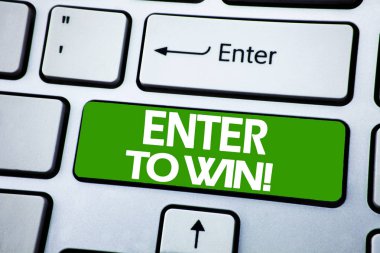 El yazısı duyuru ENTER kazanmak için gösterilen metin. İş kavramı mavi tuş klavye arka plan üzerinde yazılı yarışma kazanmak için.