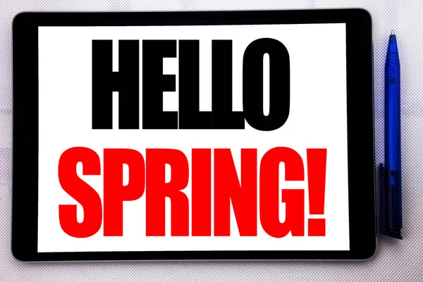 Conceptual hand writing text caption inspiration showing Hello Spring . Business concept for Summer Time Welcoming written on tablet computer on the white background with pen in the office. — Stock Photo, Image