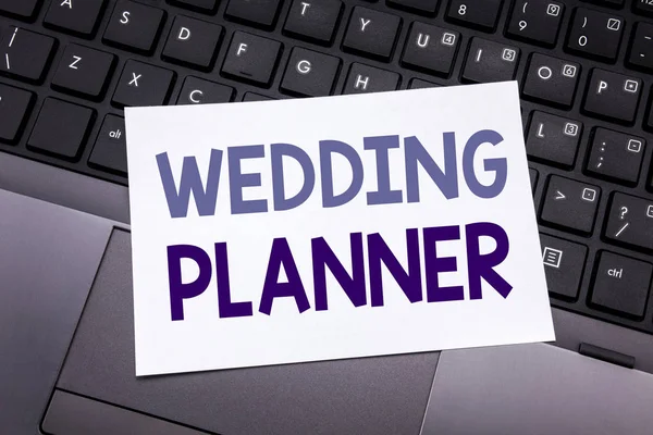 Hand writing text caption inspiration showing Wedding Planner. Business concept for Marriage Preparation written on sticky note paper on the black keyboard background. — Stock Photo, Image