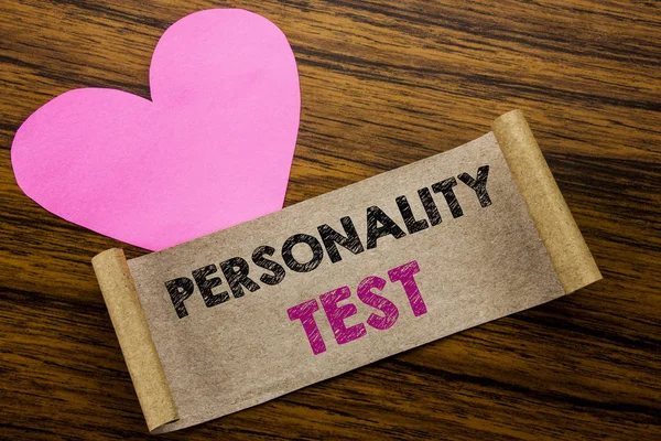 Writing text showing Personality Test. Business concept for Attitude Assessment written on sticky note paper, wooden wood background. With pink heart meaning love adoration.