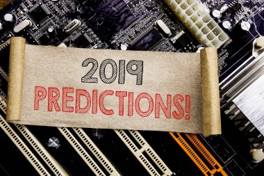 Writing text showing 2019 Predictions. Business concept for Forecast Predictive Written on sticky note, computer main board background. clipart
