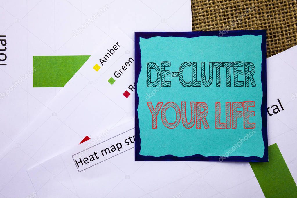 Conceptual writing text showing De-Clutter Your Life. Concept meaning Free Less Chaos Fresh Clean Routine written on Sticky Note Paper on the textured background. Heat Map Status