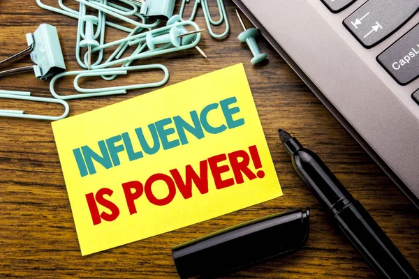 Handwriting Announcement text showing Influence Is Power. Business concept for Persuasion Strategy written on sticky note paper on the wooden background next to the laptop keyboard With marker — Stock Photo, Image