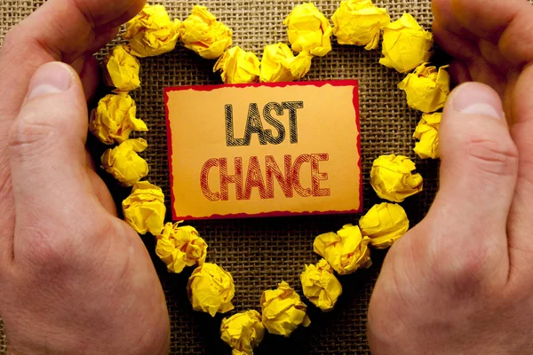 Conceptual writing showing Last Chance. Business photo showcasing Announcement Alert Time or Deadline Ending written on Sticky Note Paper With Heart Holding Hand with Finger — Stock Photo, Image