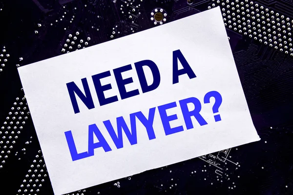 Handwritten text showing Need A Lawyer. Business concept for Advocacy Justice Help Written on sticky note, computer main board background. — Stock Photo, Image