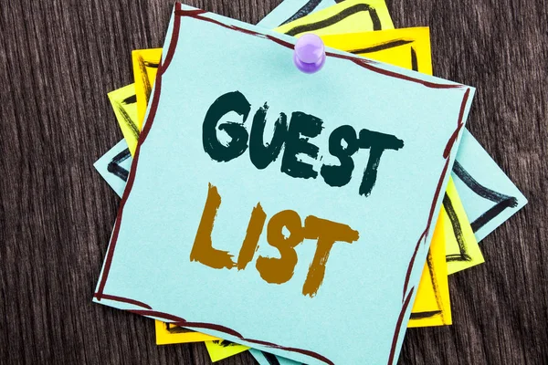 Word, writing, text  Guest List. Business concept for Planning Wedding Or Event Important Guests Lists written on Blue Sticky Note Paper on the wooden background.