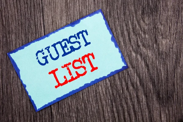 Writing text showing  Guest List. Business photo showcasing Planning Wedding Or Event Important Guests Lists written on Blue Sticky Note Paper on the wooden background.