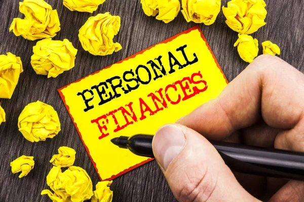 Word, writing, text  Personal Finances. Business concept for Finance Financial Investment Plan For Success Wealth written By Man Holding Marker on Sticky Note Foded Paper.