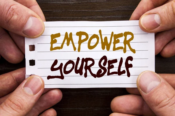 Handwritten text sign showing Empower Yourself. Business concept for Positive Motivation Advice For Personal Development written on Sticky Note Paper Holding Hand with Finger. — Stock Photo, Image