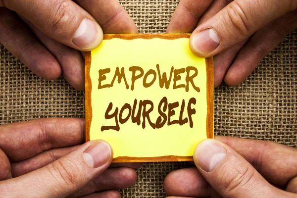 Conceptual hand writing showing Empower Yourself. Business photo showcasing Positive Motivation Advice For Personal Development written on Sticky Note Paper Holding Hand with Finger. — Stock Photo, Image