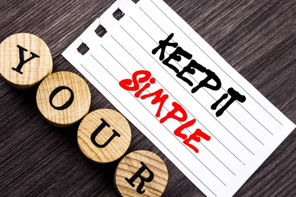 Writing text showing  Keep It Simple. Business photo showcasing Simplicity Easy Strategy Approach Principle written on tear note paper sticky note on the wooden background. — Stock Photo, Image