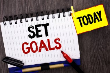 Metin ayarla gol yazma kelime. Hedef planlama vizyon rüyalar gol fikir amacı hedef defter kitap ahşap arka plan bugün Marker yanındaki yazılı motivasyon için iş kavramı.