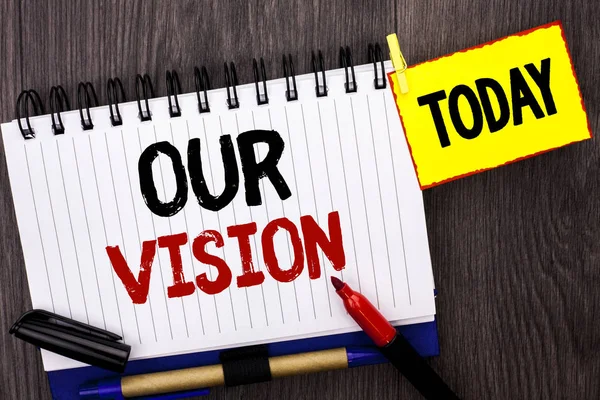 Word writing text Our Vision. Business concept for Innovation Strategy Mission Goal Plan Dream Aim Direction written on Notebook Book on the wooden background Today Marker next to it.