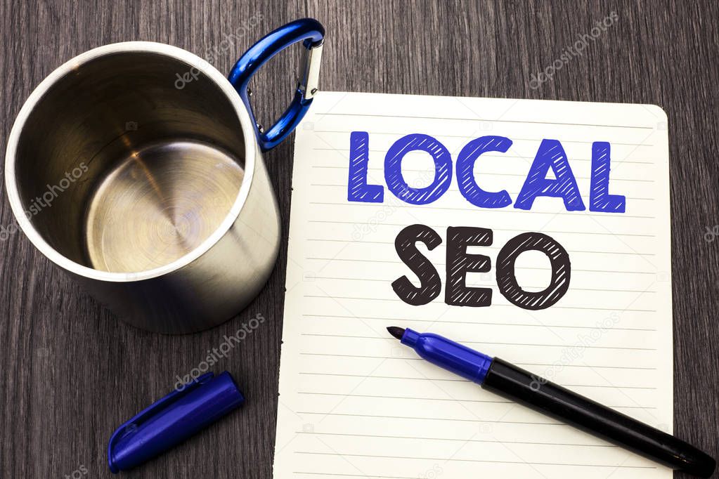 Conceptual hand writing showing Local Seo. Business photo showcasing Search Engine Optimization Strategy Optimize Local Find Keywords written on Notebook Paper wooden background Marker and Cup