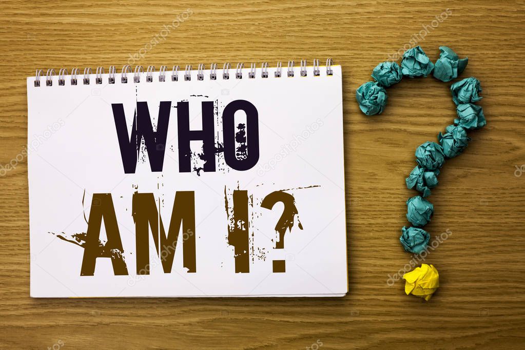 Text sign showing Who Am I Question. Conceptual photo Question Asked Identity Thinking Doubt Psycology Mystery written on Notebook Book on the Wooden background Ask for.