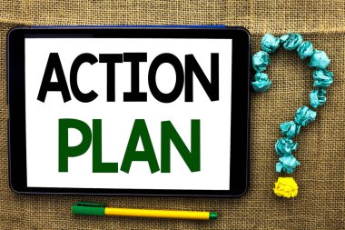 Kavramsal el eylem planı gösterilen yazma. İş fotoğraf metin strateji operasyonel planlama yordamı Etkinlik hedef Tablet kalem yanındaki sormak için jüt arka plan üzerinde yazılı amaç.