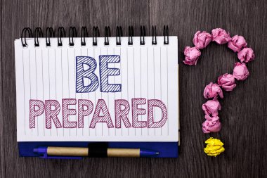 Handwriting text Be Prepared. Concept meaning Preparedness Challenge Opportunity Prepare Plan Management written on Notebook Book on the wooden background Pen and Question Mark next to it. clipart