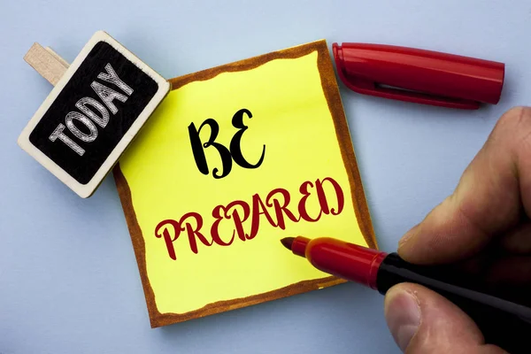Word writing text Be Prepared. Business concept for Preparedness Challenge Opportunity Prepare Plan Management written by Man Holding Marker on Sticky Note Paper on the plain background Today — Stock Photo, Image