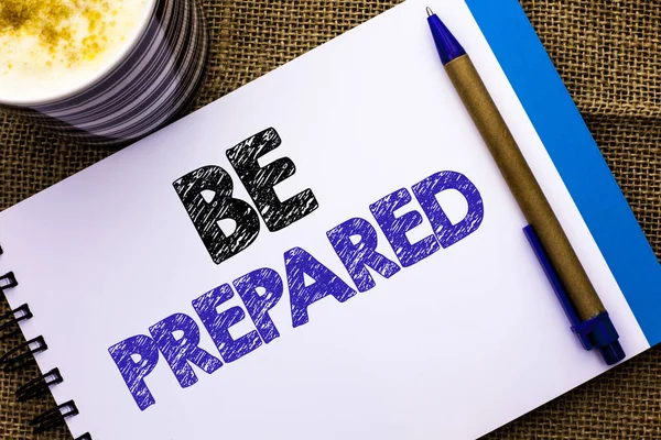 Conceptual hand writing showing Be Prepared. Business photo showcasing Preparedness Challenge Opportunity Prepare Plan Management written on Notebook Book on the jute background Pen and Cup — Stock Photo, Image