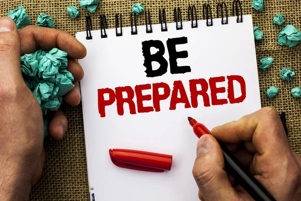 Conceptual hand writing showing Be Prepared. Business photo text Preparedness Challenge Opportunity Prepare Plan Management written by Man Holding Marker on Notebook Book on jute background — Stock Photo, Image