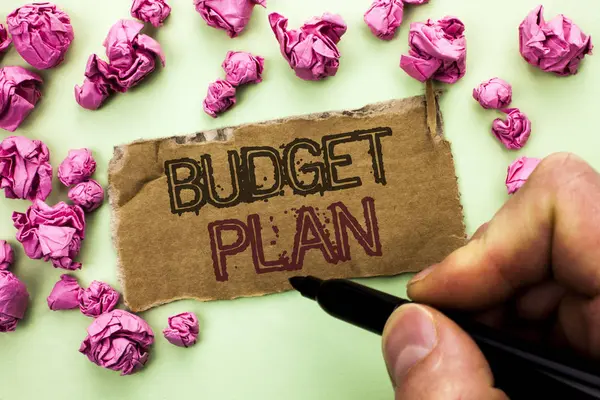 Writing note showing  Budget Plan. Business photo showcasing Accounting Strategy Budgeting Financial Revenue Economics written by Man Holding Marker on Tear Cardboard Piece plain background. — Stock Photo, Image