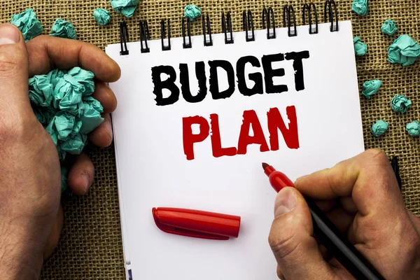 Conceptual hand writing showing Budget Plan. Business photo text Accounting Strategy Budgeting Financial Revenue Economics written by Man Holding Marker on Notebook Book on jute background — Stock Photo, Image