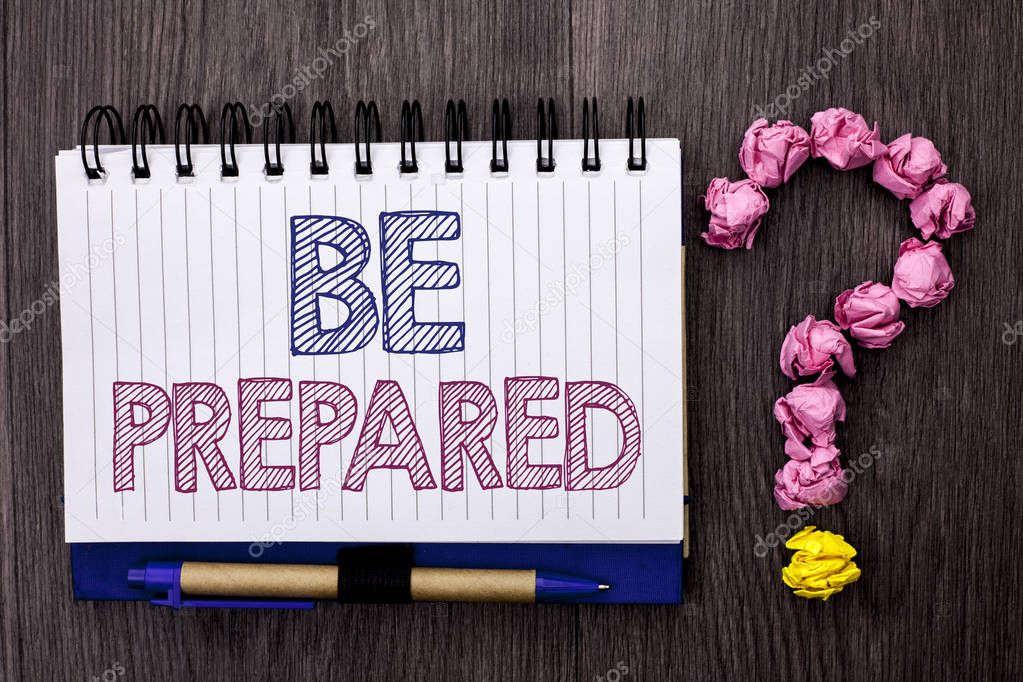 Handwriting text Be Prepared. Concept meaning Preparedness Challenge Opportunity Prepare Plan Management written on Notebook Book on the wooden background Pen and Question Mark next to it.