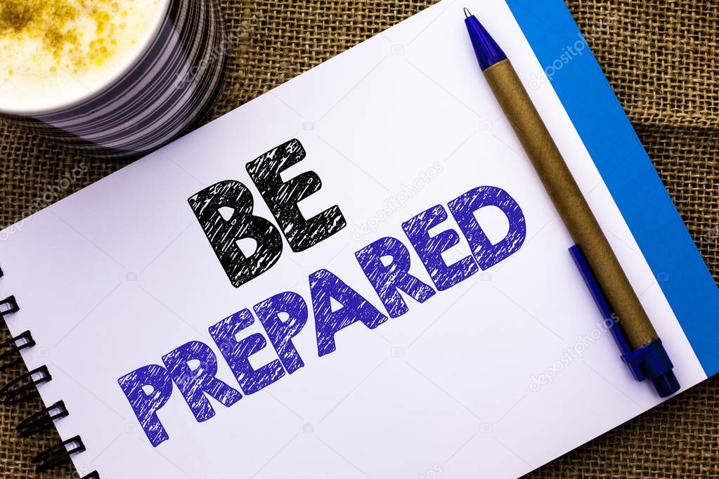 Conceptual hand writing showing Be Prepared. Business photo showcasing Preparedness Challenge Opportunity Prepare Plan Management written on Notebook Book on the jute background Pen and Cup