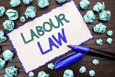 Writing note showing  Labour Law. Business photo showcasing Employment Rules Worker Rights Obligations Legislation Union written on Cardboard Piece on the wooden background Marker next to it. clipart