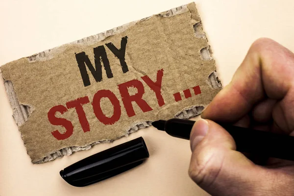 Writing note showing  My Story.... Business photo showcasing Biography Achievement Personal History Profile Portfolio written by Man Holding Marker on tear Cardboard Piece Plain Background. — Stock Photo, Image