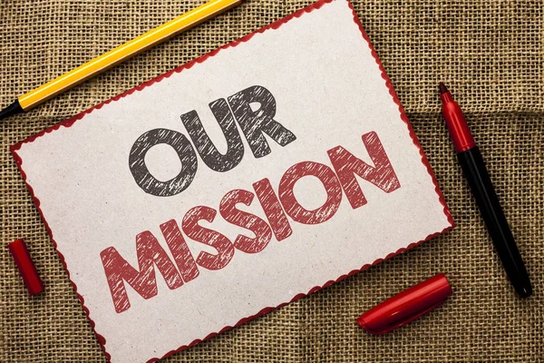 Writing note showing  Our Mission. Business photo showcasing Goal Motivation Target Growth Planning Innovation Vision written on Cardboard Piece on the jute background Markers next to it. — Stock Photo, Image