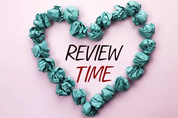 Conceptual hand writing showing Review Time. Business photo text Evaluating Survey Reviewing Analysis Checkup Inspection Revision written on Plain background within Heart Paper Balls. — Stock Photo, Image