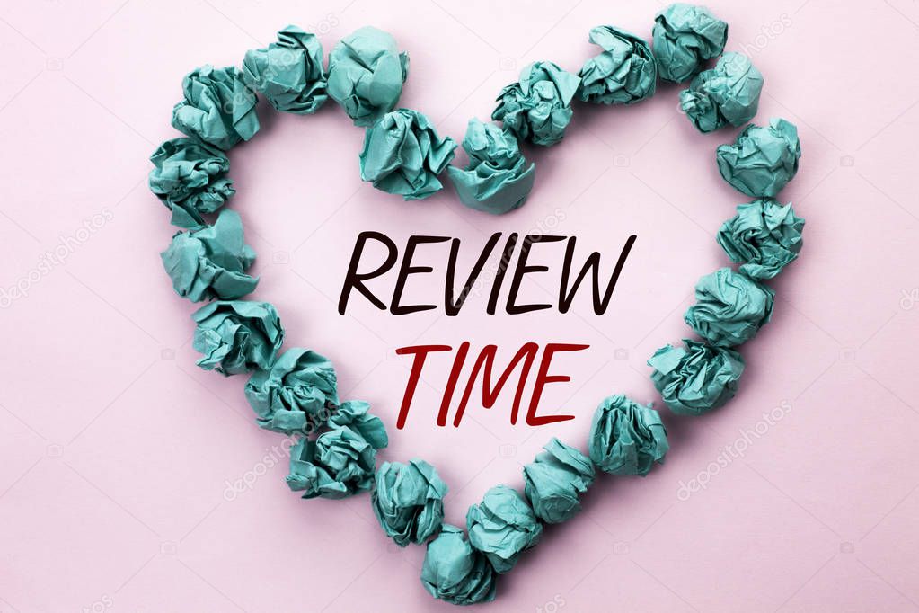 Conceptual hand writing showing Review Time. Business photo text Evaluating Survey Reviewing Analysis Checkup Inspection Revision written on Plain background within Heart Paper Balls.