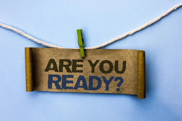 Handwriting text Are You Ready Question. Concept meaning Be Prepared Motivated Warned Readiness Aware written on Cardboard Paper hanging on rope on the plain background Clip. — Stock Photo, Image