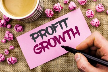 Kavramsal el kar büyüme gösteren yazma. İş fotoğraf metin finansal başarı artan gelirleri evrim adam tutarak Marker tarafından kağıt üzerinde yazılı jüt özgeçmişlerine Kupası kalkınma