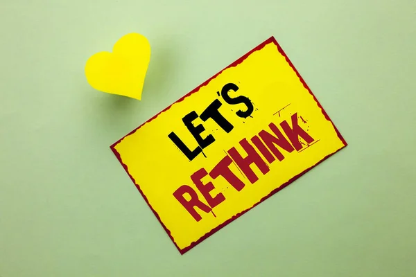 Word writing text Let Us Rethink. Business concept for Give people time to think things again Remodel Redesign written on Yellow Sticky Note Paper on the Plain background Heart next to it. — Stock Photo, Image