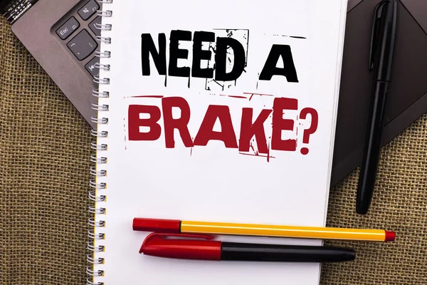 Writing note showing  Need A Brake Question. Business photo showcasing Vacation Needed Separation Wanted Split Relax Time written on Notebook Book placed on Laptop with jute background Pens — Stock Photo, Image