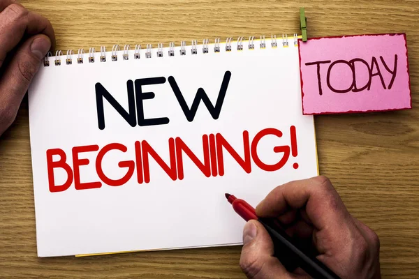 Word writing text New Beginning Motivational Call. Business concept for Fresh Start Changing Form Growth Life written by Man on Notebook Book Holding Marker on the Wooden background Today.