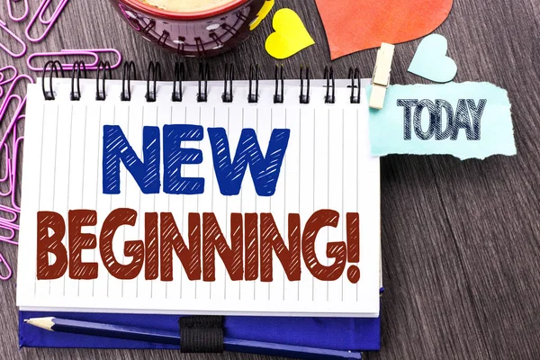 Handwriting text writing New Beginning Motivational Call. Concept meaning Fresh Start Changing Form Growth Life written on Notebook Book on the Wooden background Today Hearts Pins next to it.