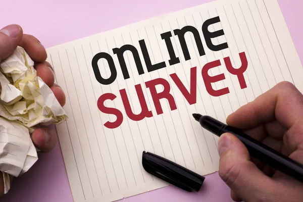 Word writing text Online Survey. Business concept for Digital Media Poll Customer Feedback Opinions Questionnaire written by Man on Notebook Paper Holding Marker on the plain background. — Stock Photo, Image