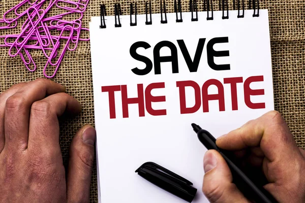 Text sign showing Save The Date. Conceptual photo Remember not to schedule anything else that time Appointment written by Man Holding Marker on Notebook Book on the jute background Pins next to it — Stock Photo, Image