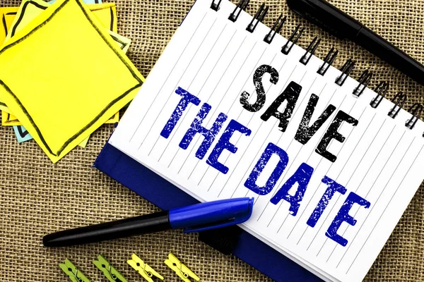 Conceptual hand writing showing Save The Date. Business photo showcasing Remember not to schedule anything else that time Appointment written on Notebook Book on the jute background Clips and Pens — Stock Photo, Image