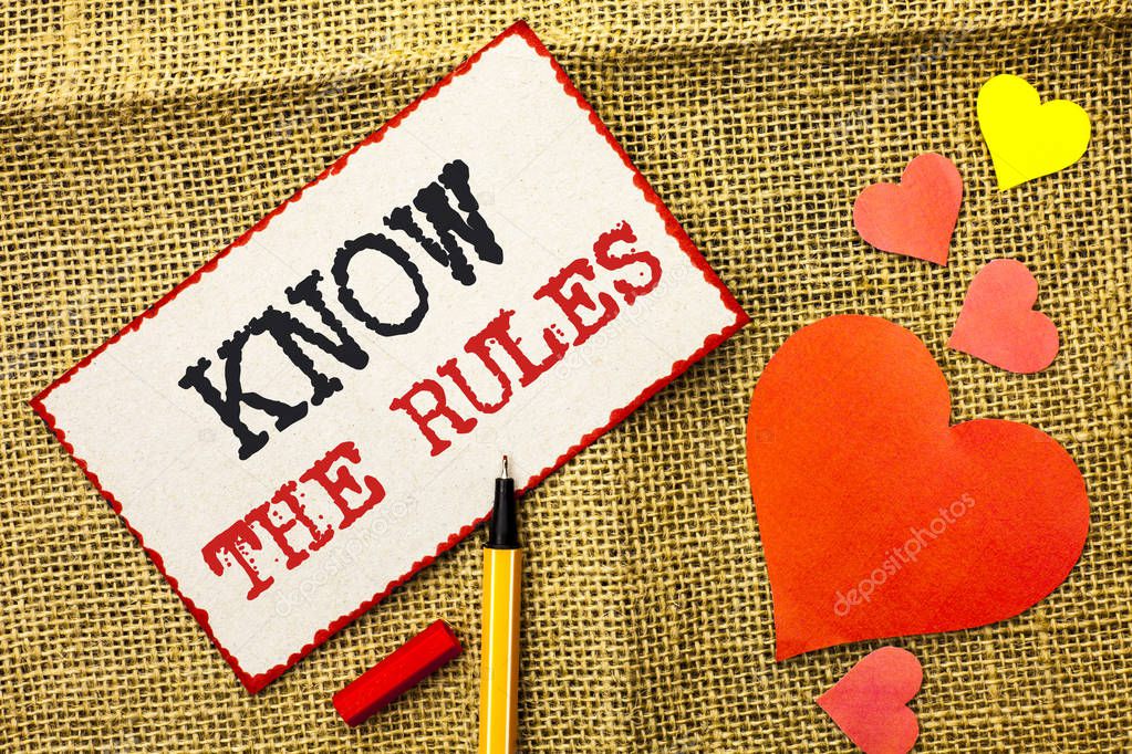 Handwriting text Know The Rules. Concept meaning Be aware of the Laws Regulations Protocols Procedures written on Sticky Note Paper by Pointer on the jute background Love Hearts next to it.