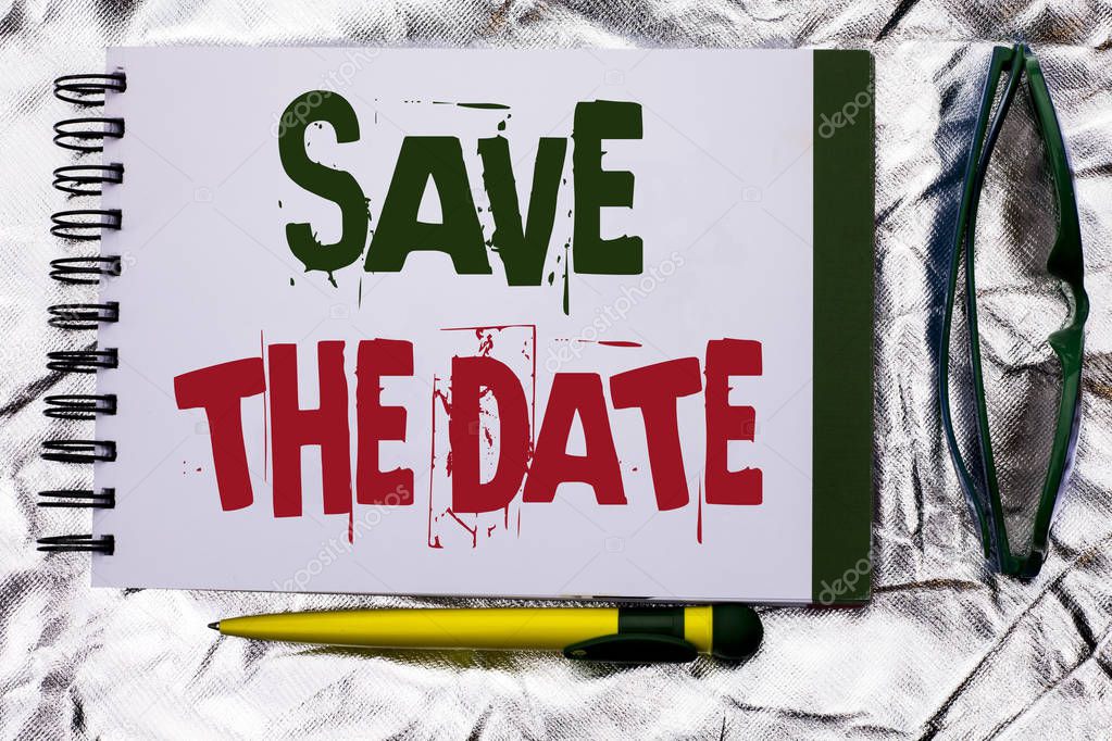 Text sign showing Save The Date. Conceptual photo Remember not to schedule anything else that time Appointment written on Notebook Book on the textured background with Pen and Glasses next to it.