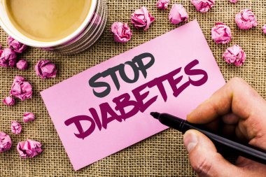 Kavramsal el durdurmak diyabet gösterilen yazma. İş fotoğraf metin kendine iyi bak şeker düzeyleri sağlıklı diyet beslenme adam tutarak Marker jüt özgeçmişlerine Kupası kağıtta yazılı alışkanlıkları