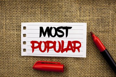 Metin yazma en popüler kelime. İş kavramı üst puan Bestseller favori ürün veya sanatçı için yanındaki marker ile jüt özgeçmişlerine defter kağıt üzerinde yazılı sıralamasında 1.