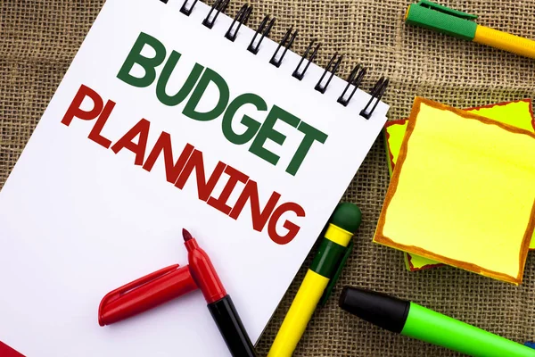 Writing note showing  Budget Planning. Business photo showcasing Financial Plannification Evaluation of earnings and expenses written on Notebook Book on the jute background Sticky Note Papers Pens — Stock Photo, Image
