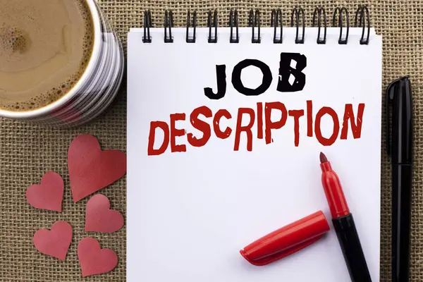 Conceptuele hand schrijven weergegeven: Job Description. Zakelijke foto presentatie van Document waarmee u taken eisen exprerience op Notebook boek geschreven op de achtergrond van de jute Cup hart Pen maakt — Stockfoto