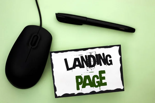 Text sign showing Landing Page. Conceptual photo Website accessed by clicking a link on another web page written on Sticky Note Paper on the plain background Pen and Mouse next to it. — Stock Photo, Image